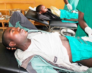 African man being circumcised